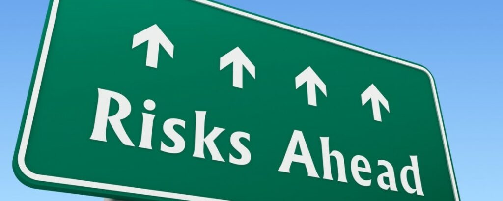 travel risks ahead sign